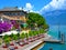 Beautiful spring view of Limone sul Garda, promenade in flowers. Limone sul Garda, famous region of Lombardy, Italy