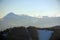 Beautiful spruces covered with snow on the background of sunlit mountains Carpathians