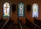 Beautiful stained glass windows grace the interior of the Saint Elizabeth of Hungary Catholic Church in Eureka Springs, Arkansas