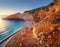 Beautiful stairs on sandy beach at sunset. Porto Katsiki