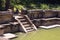 Beautiful stairway in water pool in ancient hinduist temple