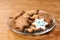 Beautiful star. Gingerbread Cookie. Glass plate. White glaze