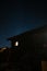 Beautiful Stars in Alpine Night Sky, With wooden hut in the foreground