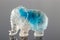 Beautiful statuette elephant from the mineral topaz on a gray background