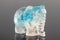 Beautiful statuette elephant from the mineral topaz on a gray background