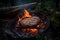 A beautiful steak being cooked to perfection over an open flame in the great outdoors. The flames lick up the sides of the grill