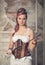 Beautiful steampunk woman with whip