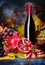 Beautiful still life with wine glasses, grapes, pomegranate