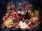 Beautiful still life with wine glasses, grapes, pomegranate on t