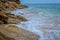 A Beautiful stones with ocean waves at hawksbay beach karachi pakistan