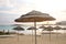 Beautiful straw umbrellas on the beach on the empty beach, bright blue water and sky, paradise tropical beach,relaxing time,,