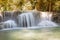 Beautiful stream waterfalls in deep forest jungleDeep forest stream waterfalls in national park of ThailandStream waterfalls close