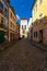 Beautiful streets of the historical part of the old town in a fall day. In the background Matthiasturm Tower of Matthias Corvinus