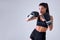 beautiful strong sports fitness boxer woman in sportswear working out isolated