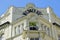 beautiful stucco facade and balcony of classic old residential building in Vienna, Austria