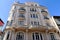 beautiful stucco facade and balcony of classic old residential building in Vienna, Austria