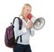 Beautiful student girl shouting in megaphone