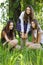 Beautiful student girls with books in the park