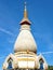 Beautiful stupa soaring into blue sky