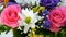 A beautiful stylish bouquet of various multi-colored flowers of daisies, roses, dried flowers. Festive bridal bouquet of