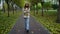 Beautiful stylish girl having walking in autumn park. Inspiring young woman .