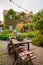 beautiful summer courtyard. wooden table with retro items.