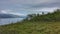 Beautiful summer landscape with mighty mountain and blue fjord