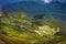 Beautiful summer landscape of mountains with alpine meadows in Abkhazia: the sun,flowering green meadows