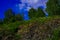 Beautiful summer landscape of nature - rocks, greenery, blue sky