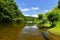 Beautiful summer landscape with river, forest, sun and blue skies. Natural colorful background. Jihlava River. Czech Republic -