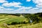 beautiful summer landscape of river in the valley, fields and forests, top view