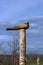 Beautiful summer landscape. Shamanka rock on the Olkhon island. Religious shamanic totems poles