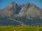 Beautiful summer panorama over Spisz highland with sheaves of hay to Tatra mountains, Poland