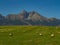 Beautiful summer panorama over Spisz highland with sheaves of hay to Tatra mountains, Poland