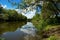 Beautiful summer park, river, reflection