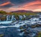 Beautiful summer scenery of Bruarfoss Waterfall, secluded spot with cascading blue waters