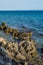 Beautiful summer seascape with lighthouse on the island in Orebic, Peljesac peninsula, Dalmatia, Croatia