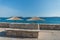 Beautiful summer seascape with sun umbrellas in Orebic, Peljesac peninsula, Dalmatia, Croatia