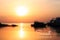 Beautiful summer sunrise or sunset on the sea. Blurred defocused background. Boats on the water. Vector template for your design