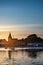 Beautiful Summer sunset landscape over low tide harbor with moor