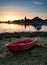 Beautiful Summer sunset landscape over low tide harbor with moor