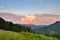 Beautiful summer sunset scene in the mountains with spectacular sky and fog. Mystical landscape. Location place Carpathian mountai