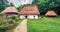 Beautiful summer view of traditional romanian peasant houses.