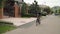 Beautiful summertime mood shot of young woman or girl riding bicycle