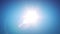 Beautiful Sun Rising and Shining Bright in the Morning Sky. Sunrise in Clear Blue Sky. Sun Moving Across the Sky. 4k UHD