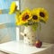 Beautiful sunflower bouquet with apple