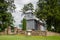 Beautiful sunlit gray wooden Catholic church