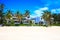 Beautiful sunny day on the beach and modern apartments, Punta Cana