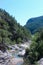 Beautiful Sunny lagoon in rocks and greenery with clear water