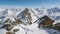 Beautiful Sunny Winter Day in Snowy Alps Mountains.Time Lapse Dolly Shot over Snowy Rocks and Majestic Peaks